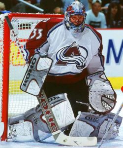 Patrick Roy, entering the butterfly position while playing for the Colorado Avalanche